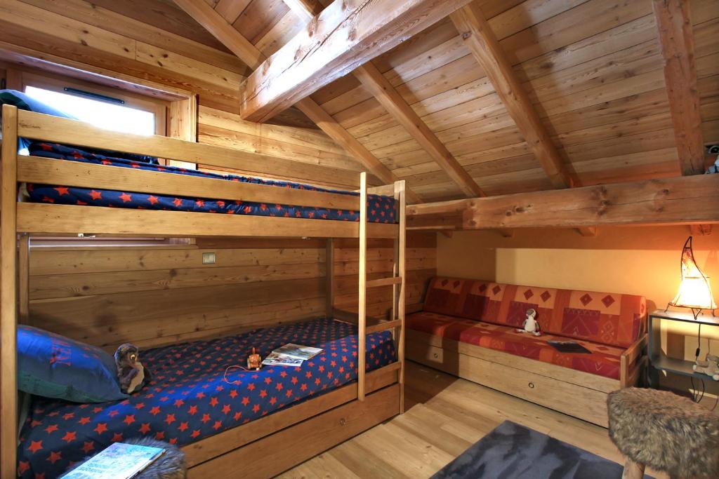Postel nebo postele na pokoji v ubytování Appartement Noel Martin - 3 chambres