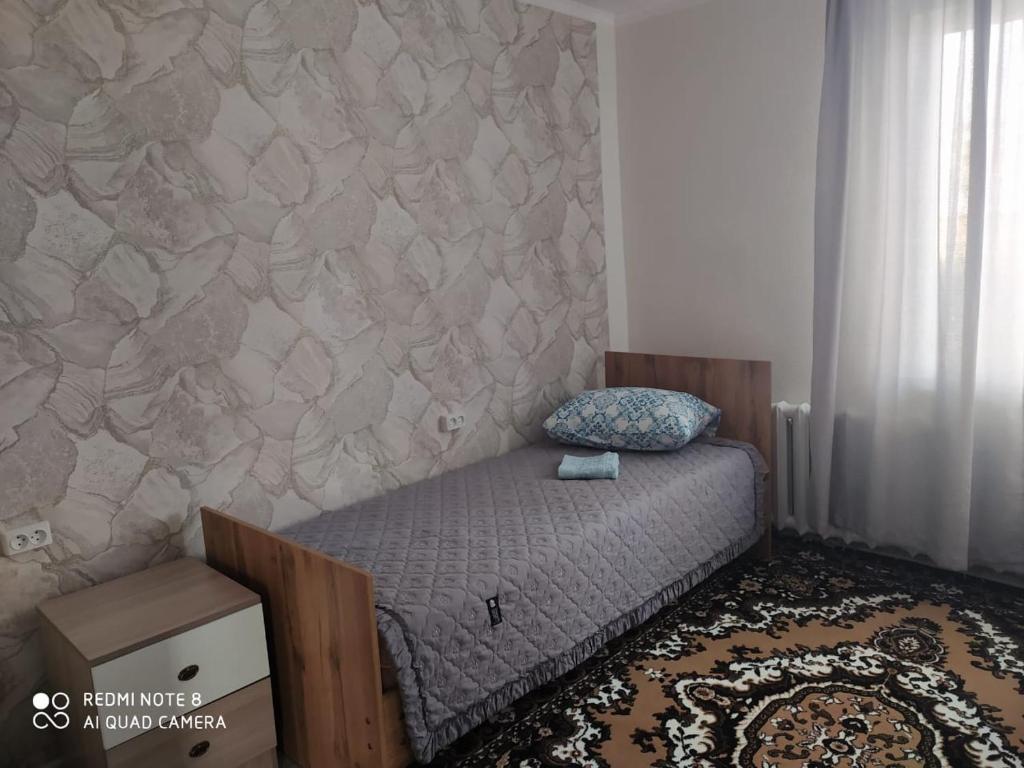Voodi või voodid majutusasutuse SunRay Guest House-Hostel toas