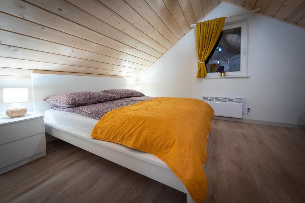 Postel nebo postele na pokoji v ubytování Domki na Stoku