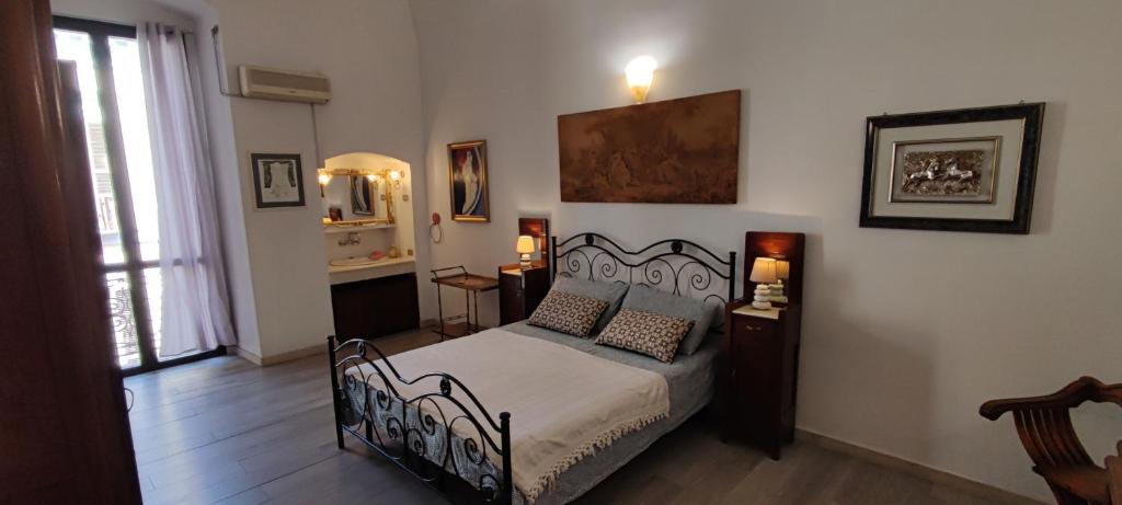 a bedroom with a bed in a room at Classy central apartment in Bari