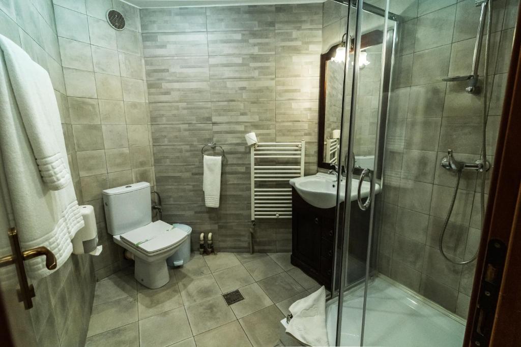 Koupelna v ubytování Hotel Royal