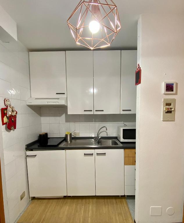 A kitchen or kitchenette at BlueSky Appartamento Monte Cervino Matterhorn