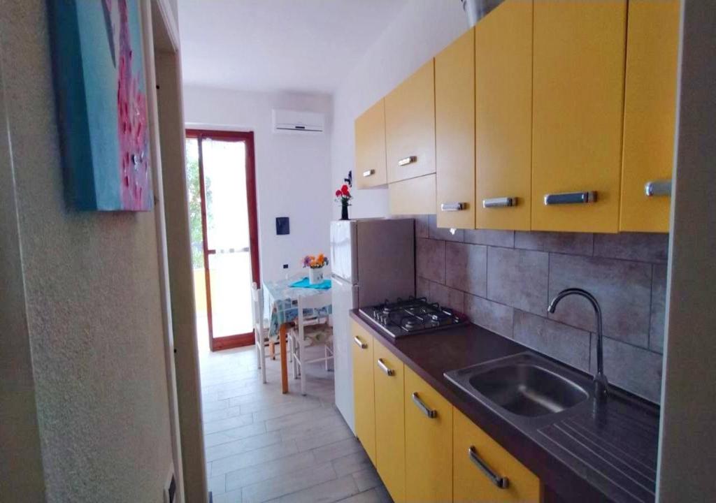 A kitchen or kitchenette at Paradise Flat - View, Garden & Parking (200Mt Sea)
