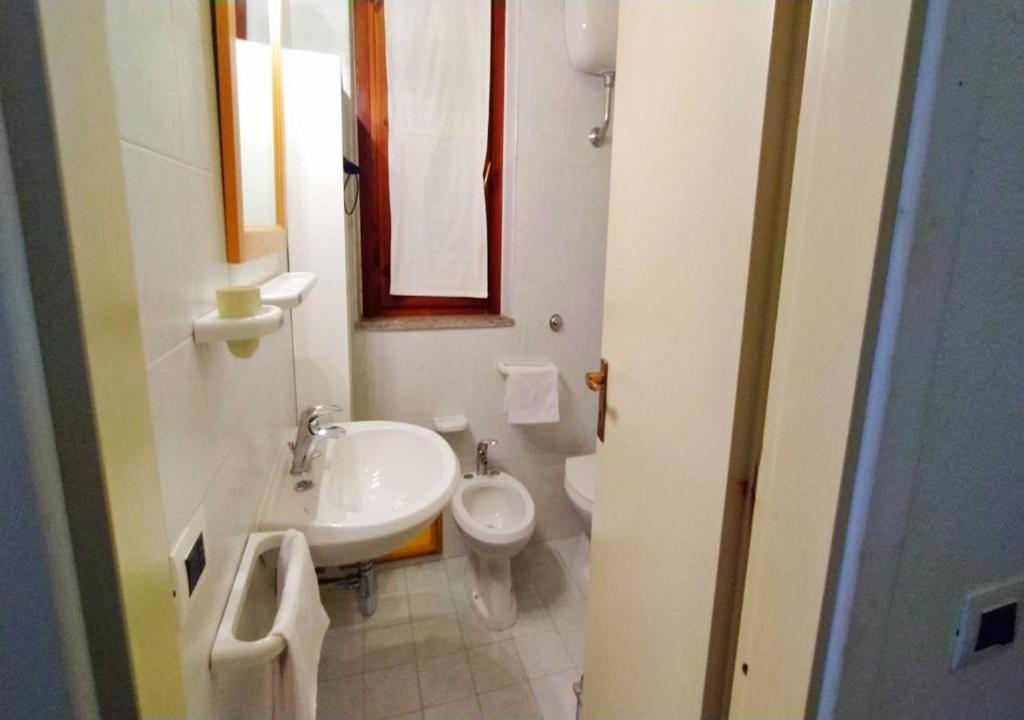 A bathroom at Paradise Flat - View, Garden & Parking (200Mt Sea)