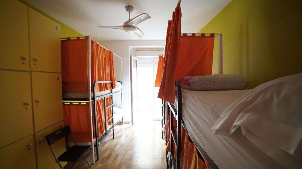 Postel nebo postele na pokoji v ubytování Summer Cádiz