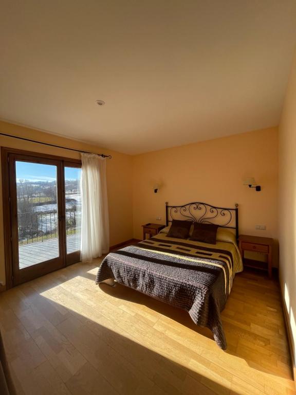 Postel nebo postele na pokoji v ubytování Hotel Cal Martri