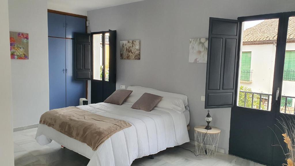 Posteľ alebo postele v izbe v ubytovaní CASA MORENA MiA APARTAMENTOS