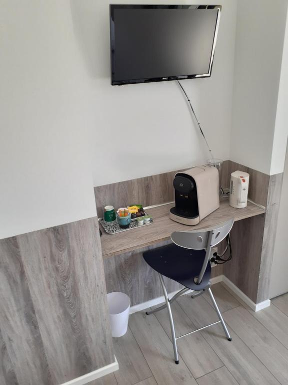 Telewizja i/lub zestaw kina domowego w obiekcie Chalet de l'Infernet