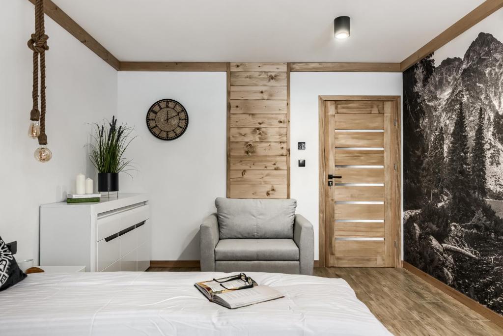 Posteľ alebo postele v izbe v ubytovaní Apartamenty Górskie Zacisze