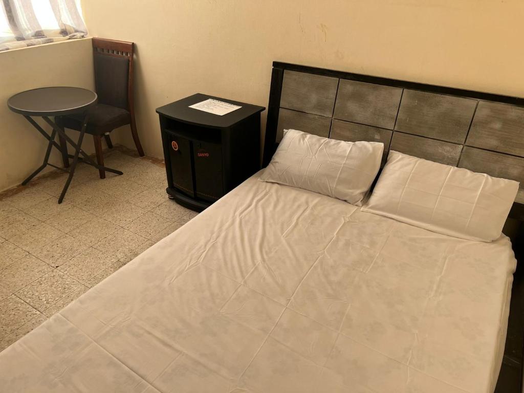 Postel nebo postele na pokoji v ubytování Gulf building, homestay