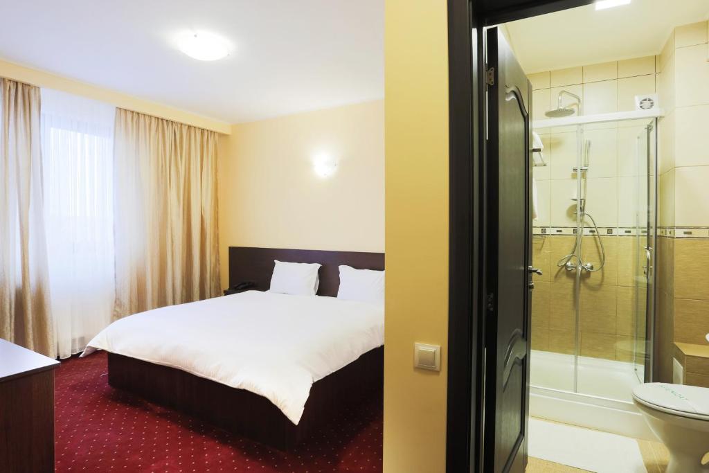 Koupelna v ubytování Hotel Athos