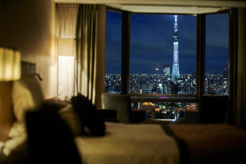 a hotel room with a view of the eiffel tower at Asakusa View Hotel in Tokyo