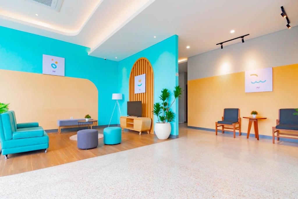 Posezení v ubytování Sans Hotel Alexander Bandung