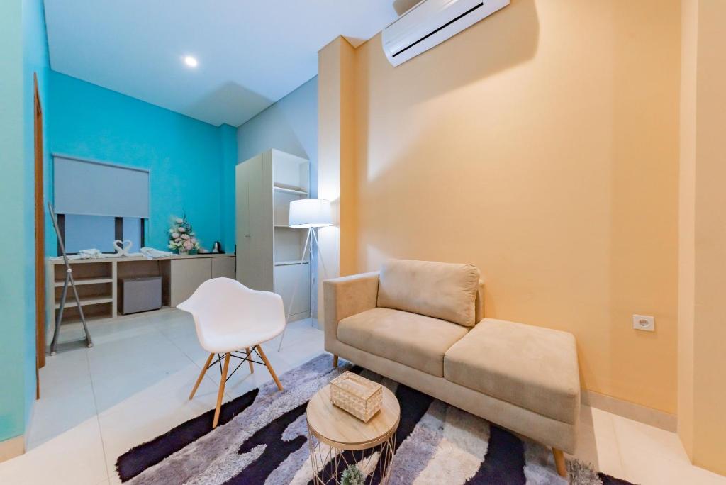 Posezení v ubytování Sans Hotel Alexander Bandung