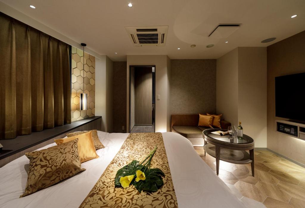 TV a/nebo společenská místnost v ubytování Hotel Cocoon -Urban Luxury-
