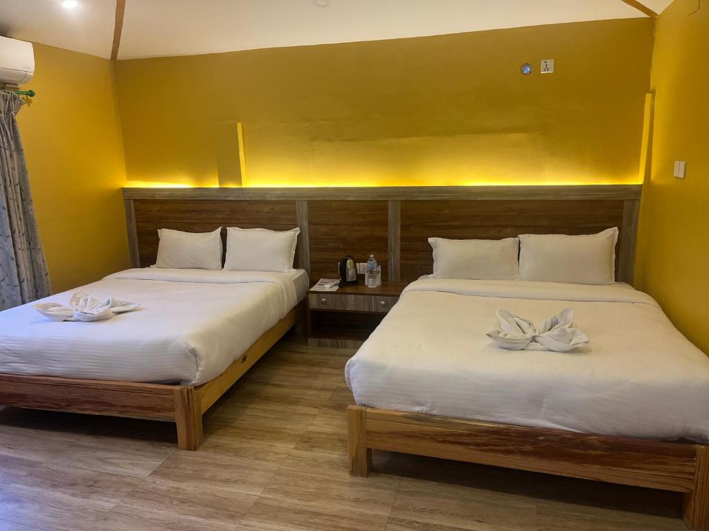 Letto o letti in una camera di The North Face Inn