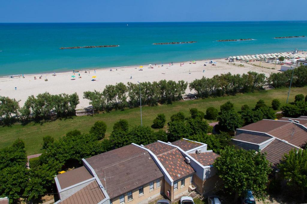 an aerial view of a beach with people on it at Residence Casabianca in Porto San Giorgio