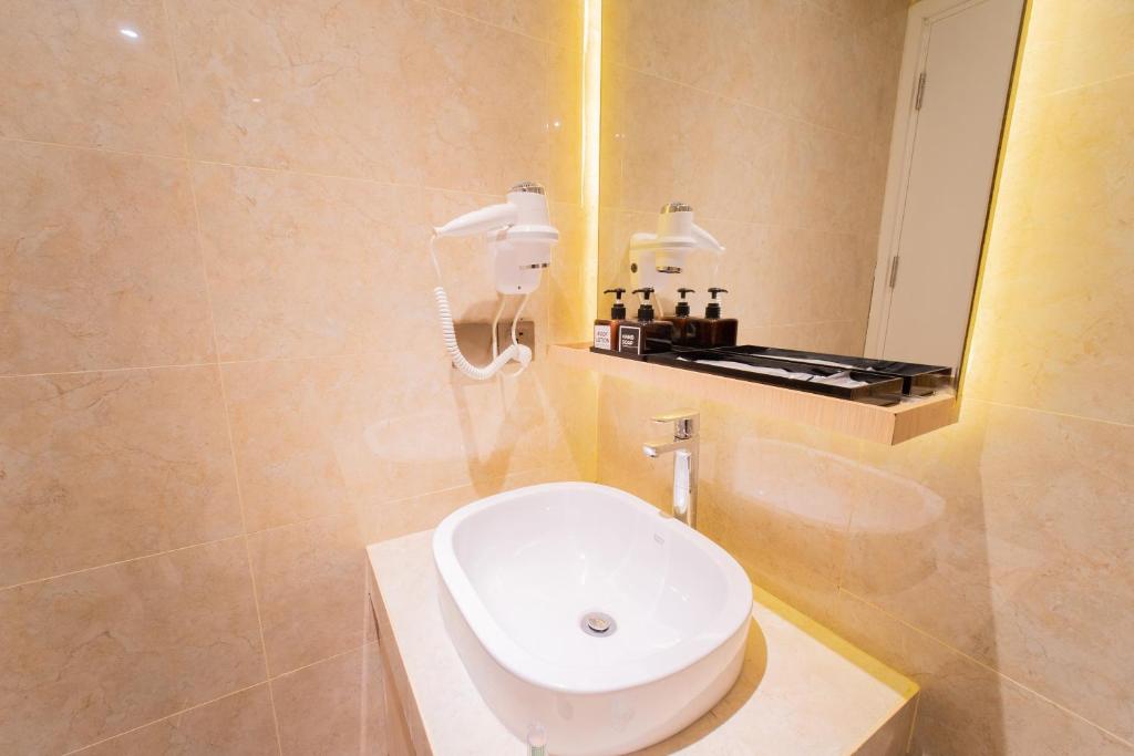 Koupelna v ubytování Pentacity Hotel Balikpapan