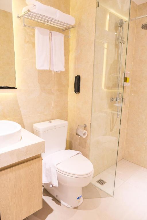 Koupelna v ubytování Pentacity Hotel Balikpapan