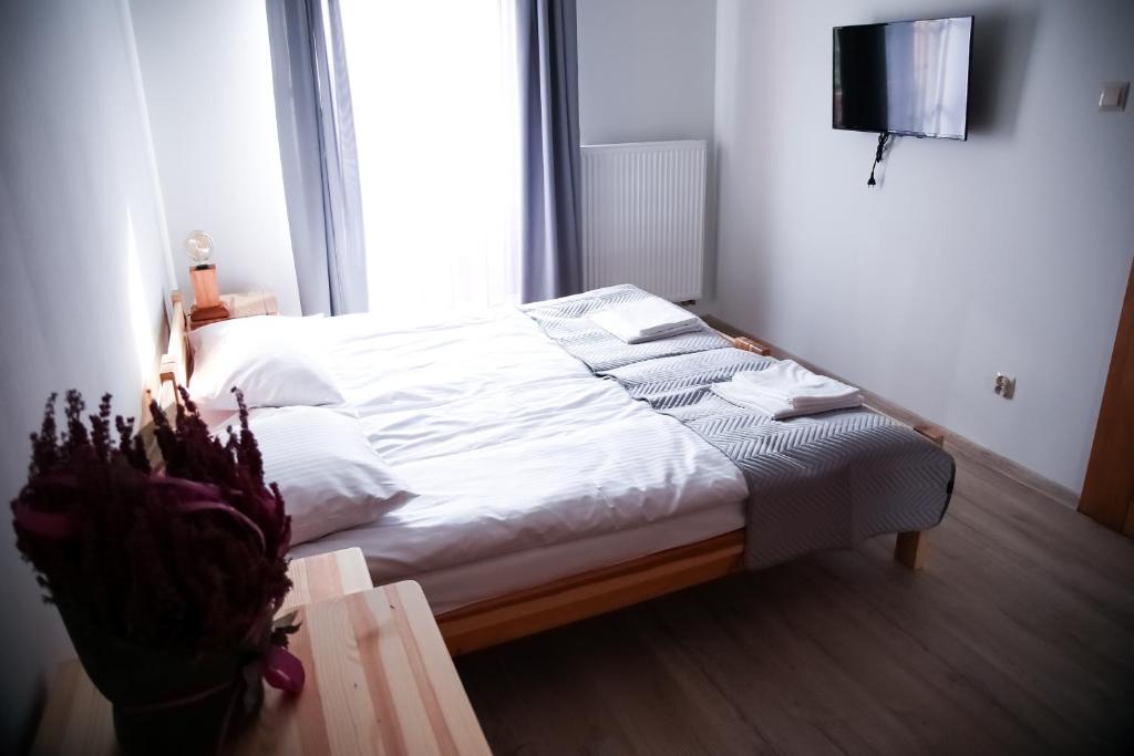 Postel nebo postele na pokoji v ubytování Gościniec Smrekowa Chata