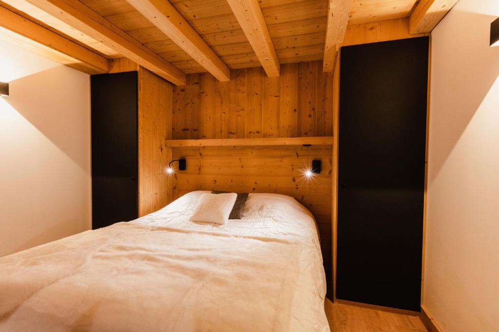 Posteľ alebo postele v izbe v ubytovaní Chalet M, pied des pistes et garage