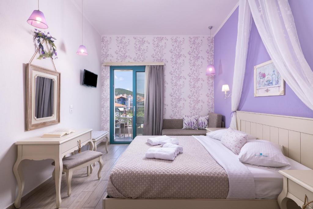 Postel nebo postele na pokoji v ubytování Villa Anthelion