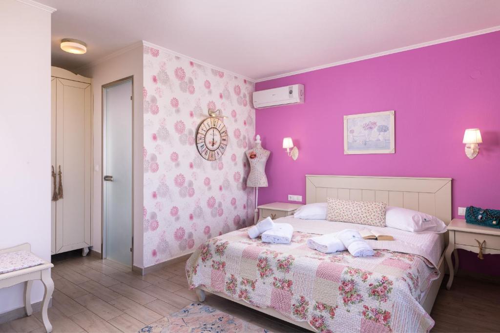 Postel nebo postele na pokoji v ubytování Villa Anthelion