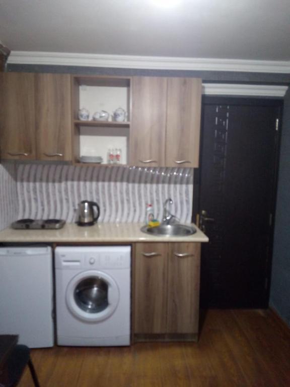 Kuchyň nebo kuchyňský kout v ubytování vake-house