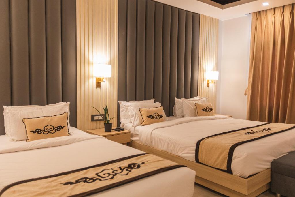 Postel nebo postele na pokoji v ubytování Lavie Residence and Spa
