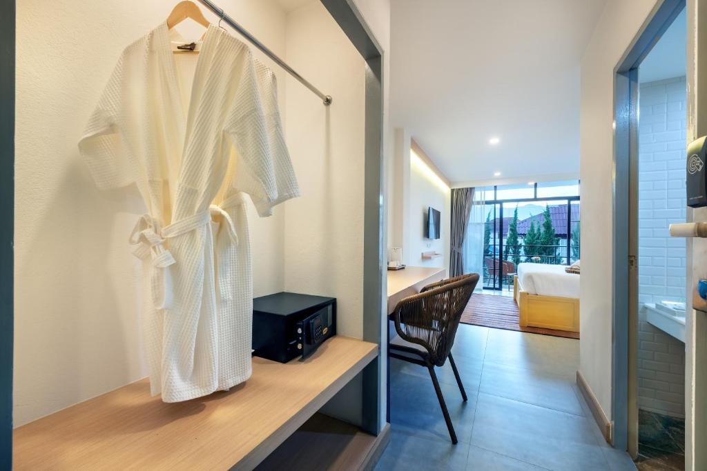 TV a/nebo společenská místnost v ubytování Ai Pai Hotel