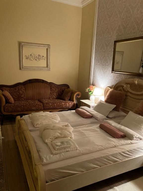 Posteľ alebo postele v izbe v ubytovaní Logod Panorama Apartman