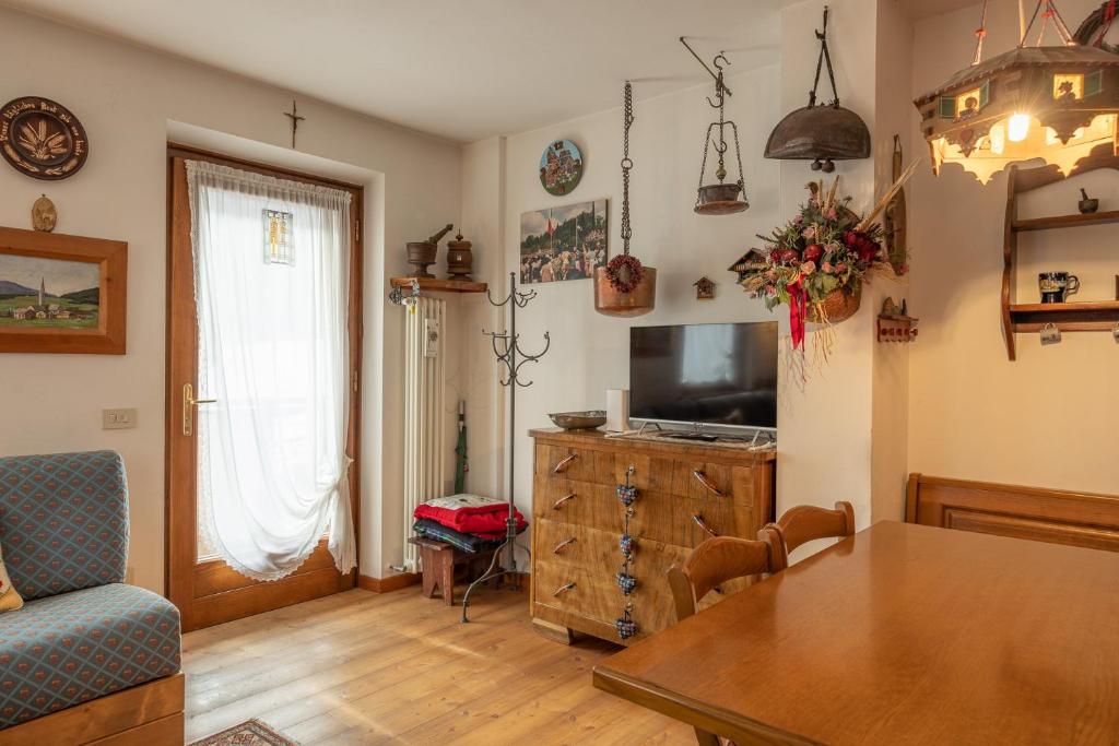 TV a/nebo společenská místnost v ubytování Casa Le Vivane