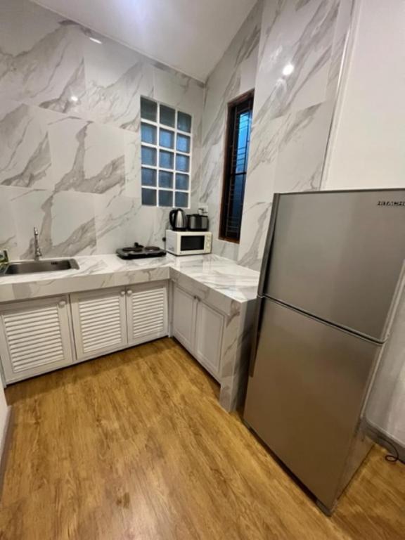 Kuchyň nebo kuchyňský kout v ubytování Samui Garden Home