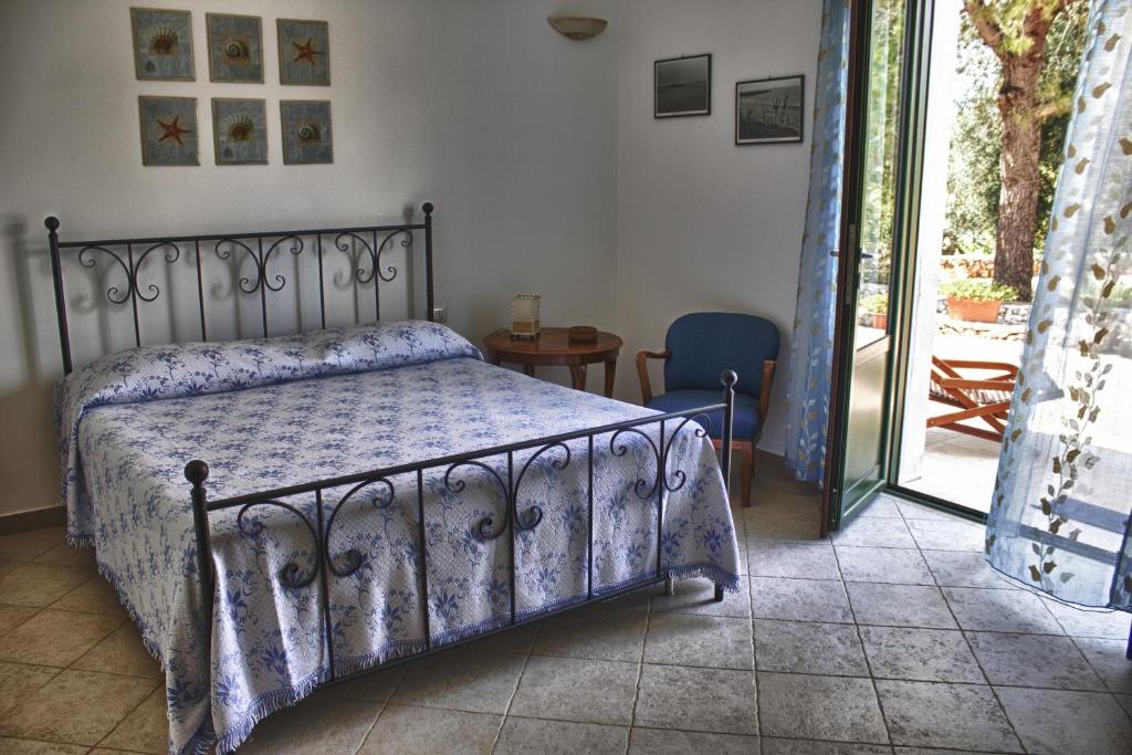 Postel nebo postele na pokoji v ubytování Almacanto B&B