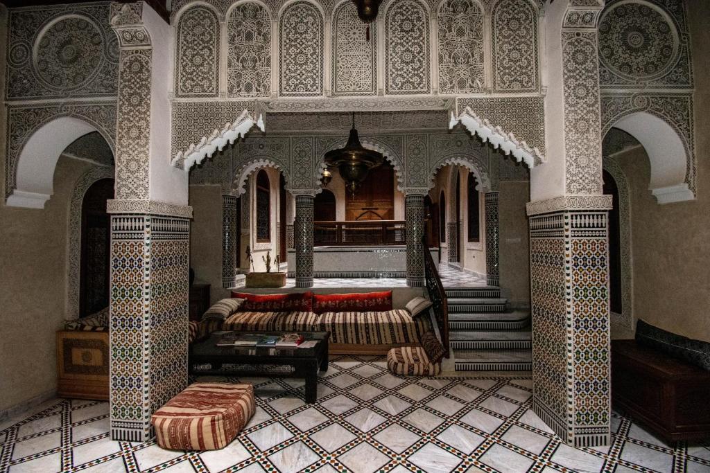 Postel nebo postele na pokoji v ubytování Riad le petit ksar