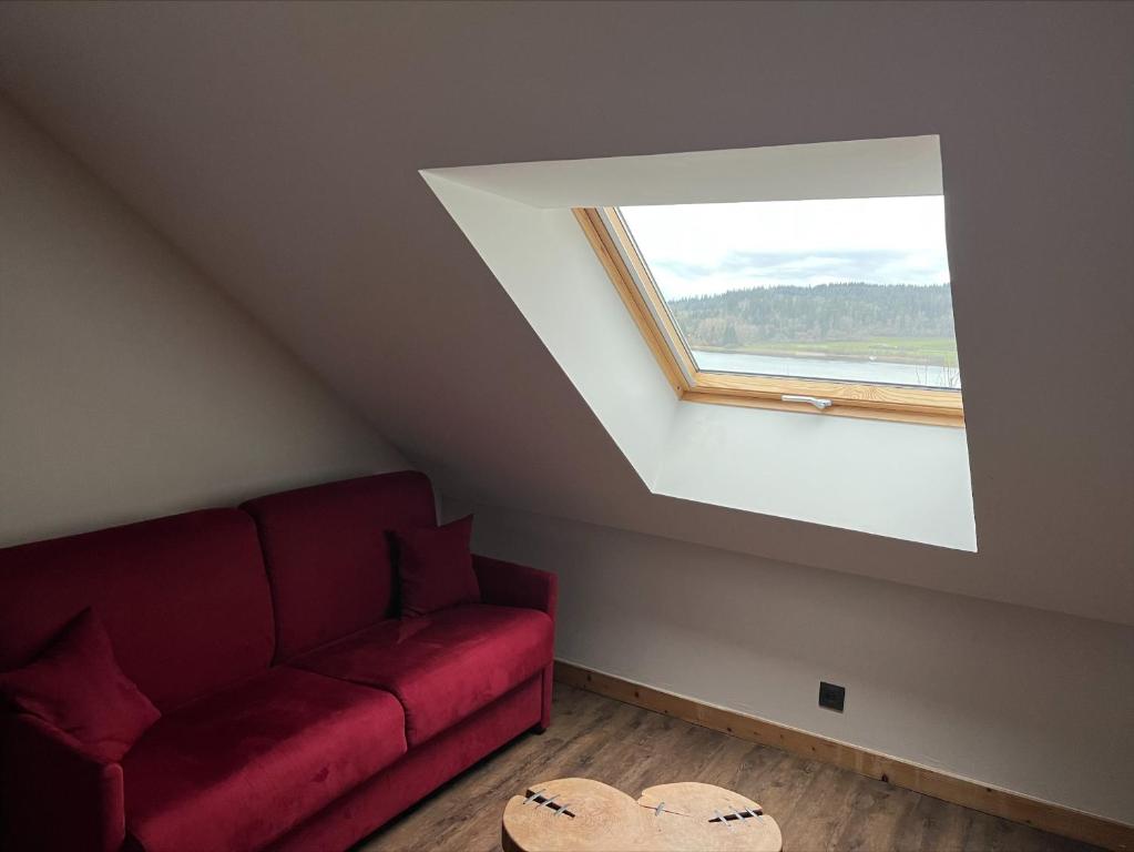 Posezení v ubytování Hôtel L'Atelier de Donat