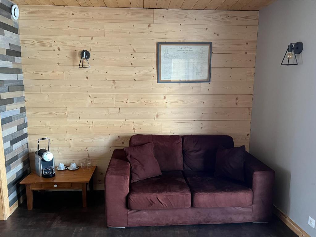 Posezení v ubytování Hôtel L'Atelier de Donat