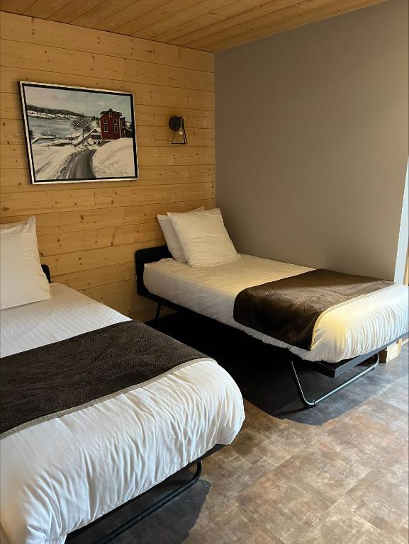 Postel nebo postele na pokoji v ubytování Hôtel L'Atelier de Donat