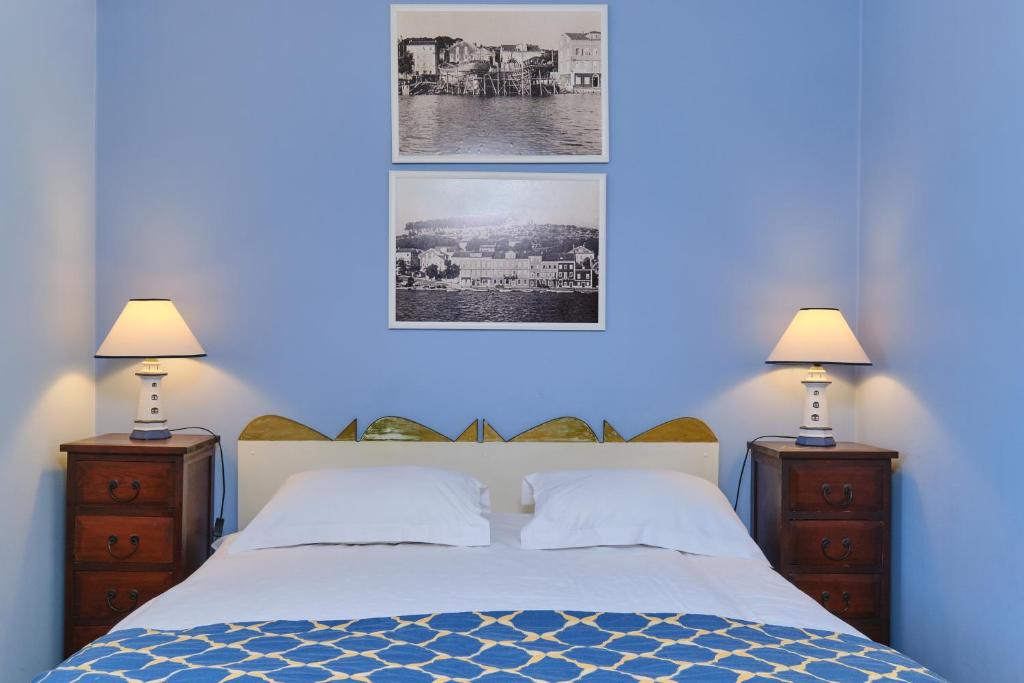 Postel nebo postele na pokoji v ubytování Mare Mare Suites