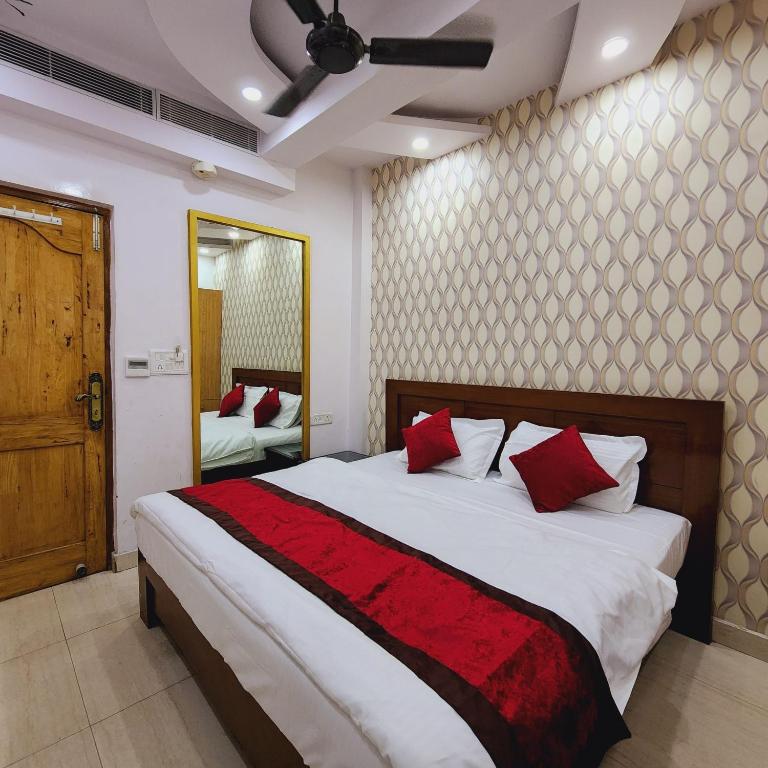 Postel nebo postele na pokoji v ubytování HOTEL ROYAL AFGHAN