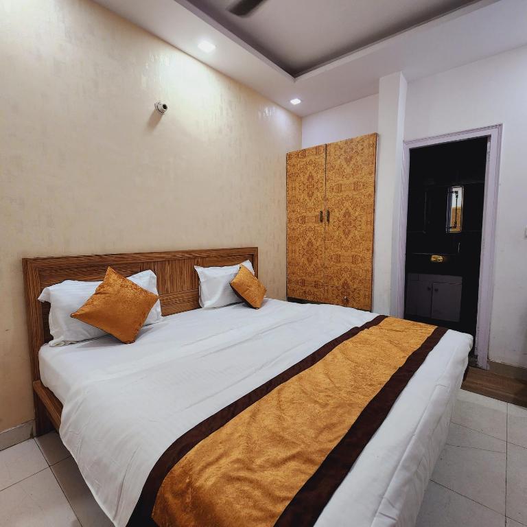 Postel nebo postele na pokoji v ubytování HOTEL ROYAL AFGHAN