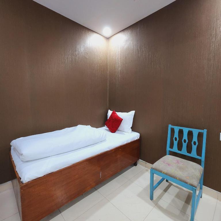 Postel nebo postele na pokoji v ubytování HOTEL ROYAL AFGHAN