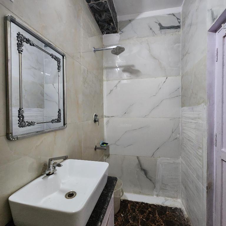 Koupelna v ubytování HOTEL ROYAL AFGHAN