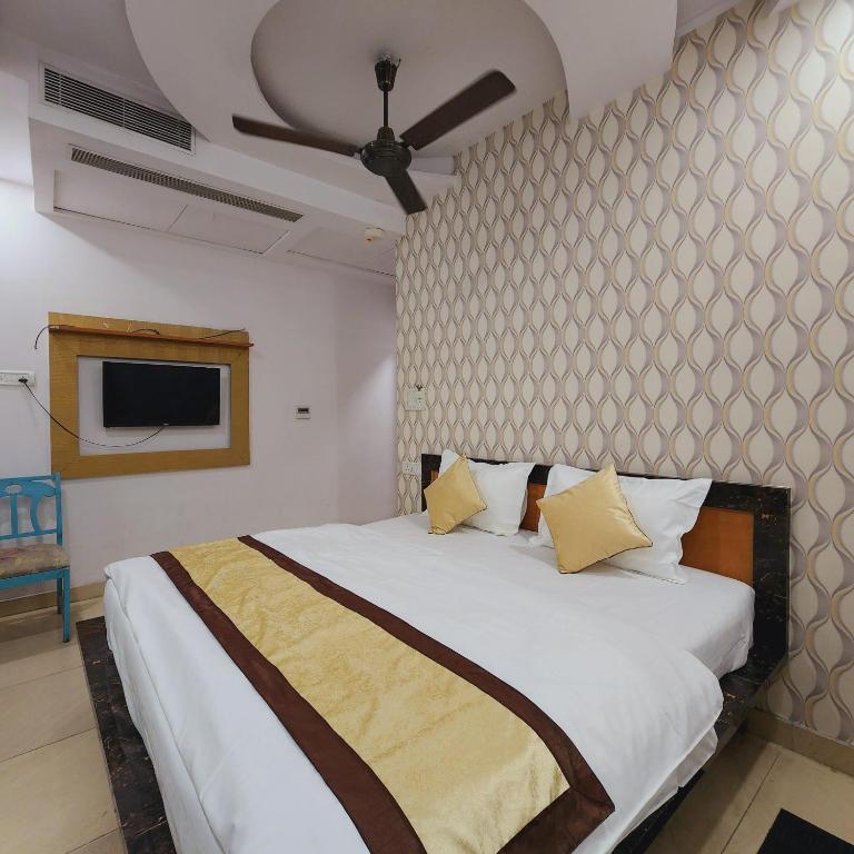 Postel nebo postele na pokoji v ubytování HOTEL ROYAL AFGHAN