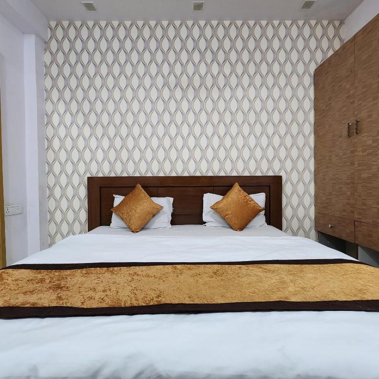 Postel nebo postele na pokoji v ubytování HOTEL ROYAL AFGHAN