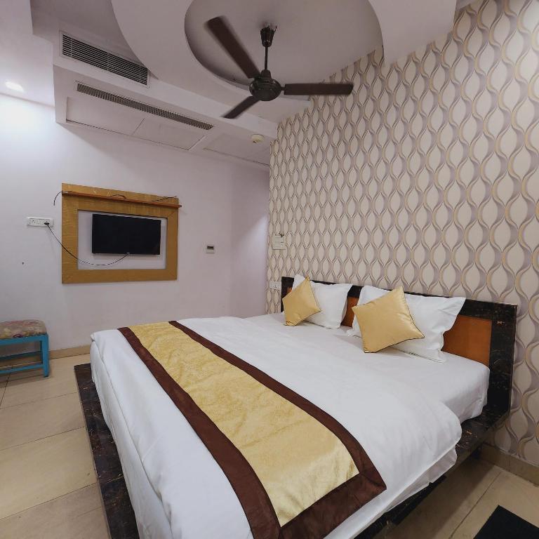 Postel nebo postele na pokoji v ubytování HOTEL ROYAL AFGHAN