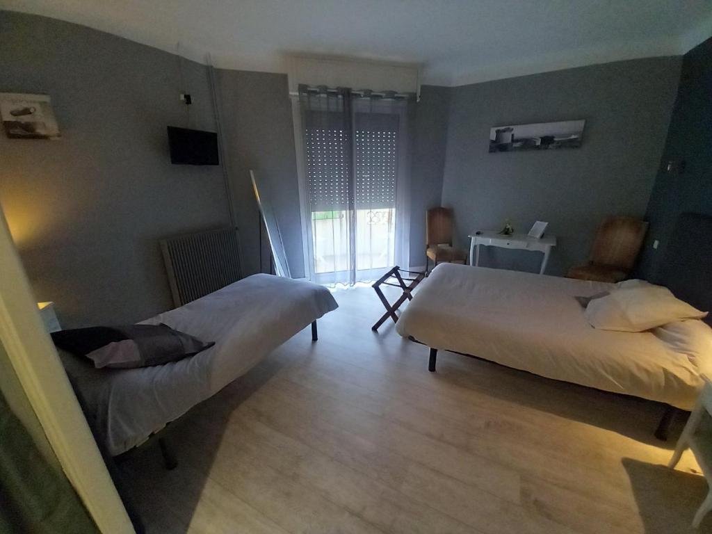 Postel nebo postele na pokoji v ubytování Chez l'ahumat