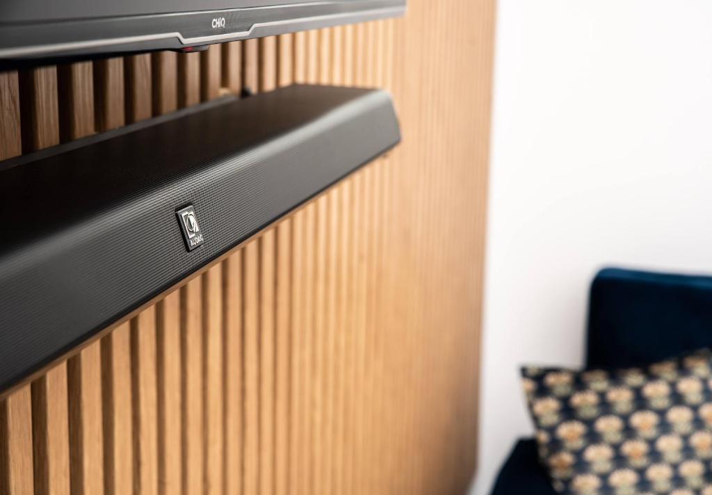 Televízia a/alebo spoločenská miestnosť v ubytovaní Apartamenty Yeti & Wilka w Centrum Chorzowa - Yeti