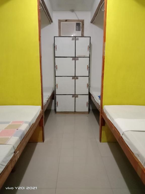 Postel nebo postele na pokoji v ubytování One Hostel - El Nido