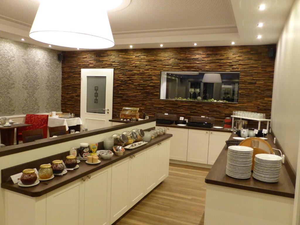 Kuchyň nebo kuchyňský kout v ubytování Hotel Pfeffermühle